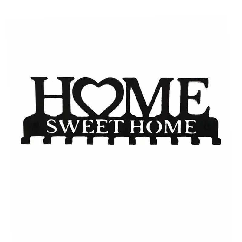 Black rustic iron wall hooks shaped like the words HOME and SWEET HOME for organization