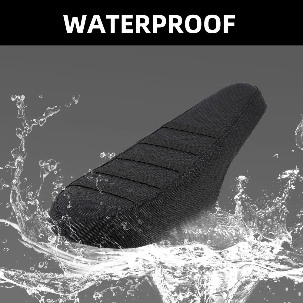 A black motorcycle seat cover is shown being splashed by water, demonstrating its waterproof property.