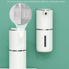 A white touchless automatic soap dispenser mounted on a wall, shown next to an inset diagram.