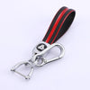 Black and red TPU leather car key cover with a silver keychain.