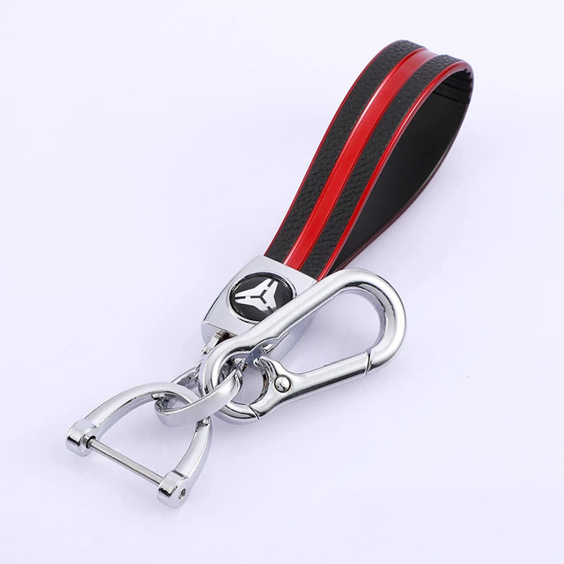 Black and red TPU leather car key cover with a silver keychain.