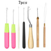 A set of seven plastic latch hook needles for crochet, dreadlocks, and rug making in various colors.