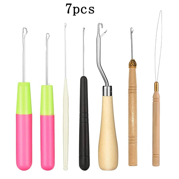 A set of seven plastic latch hook needles for crochet, dreadlocks, and rug making in various colors.