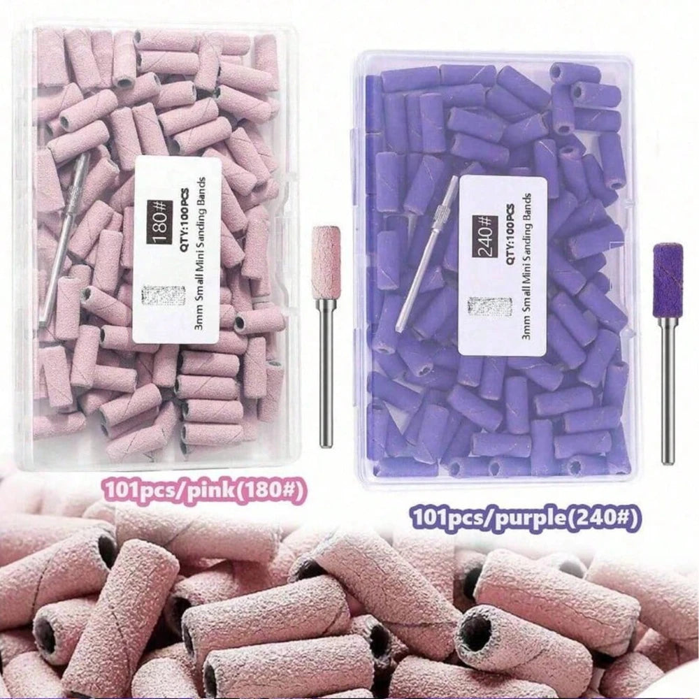 Set Mini-Nagel-Schleif- und Bohrer in rosa und lila Farben, verpackt in klarem Kunststoff.