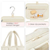 A beige portable hanging toiletry bag featuring a hidden 360 degree swivel hanger and two clear zip pockets.