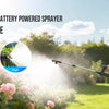 An elderly woman sprays plants outdoors using a 2 gallon battery-powered sprayer with an extendable wand.
