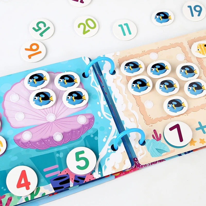A colorful Montessori toddler busy book featuring matching games and number cards on a wooden board.