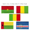 Embroidered patch of the Dominican Republic flag featuring red, yellow, and green stripes.