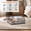 A clear acrylic organizer tray holds various items like hats, clothes, scarves, gloves, and belts on a beige rug.