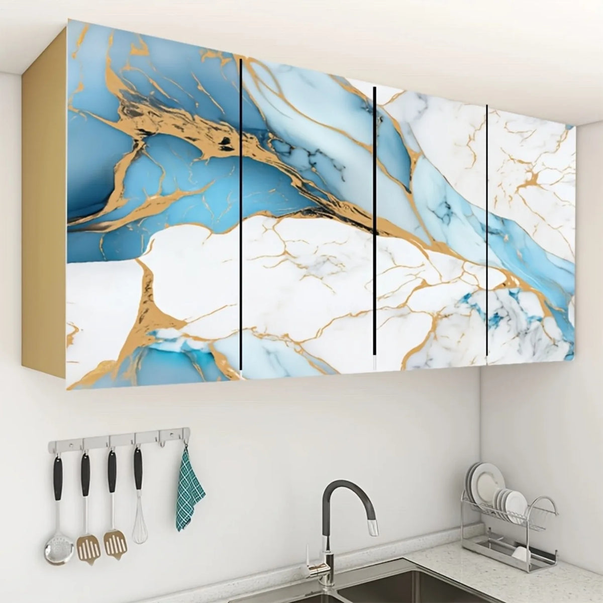 A modern kitchen or bathroom cabinet featuring self-adhesive marble contact paper with blue and gold veining.