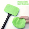 A bright green car windshield cleaning brush kit with a black handle and a separate microfiber pad.