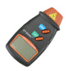 A black digital tachometer device with an orange face and buttons, featuring MEM and TEST functions.