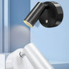 A black LED spotlight is shown mounted on a wall, with a silver version displayed below.