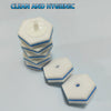 Stack of white disposable toilet cleaning wand refills with blue trim