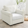 A cream-colored upholstered armchair with vertical stripes and a white seat cushion.