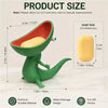 A green lizard-shaped soap holder with an open mouth design, showing its size relative to a yellow bar of soap.
