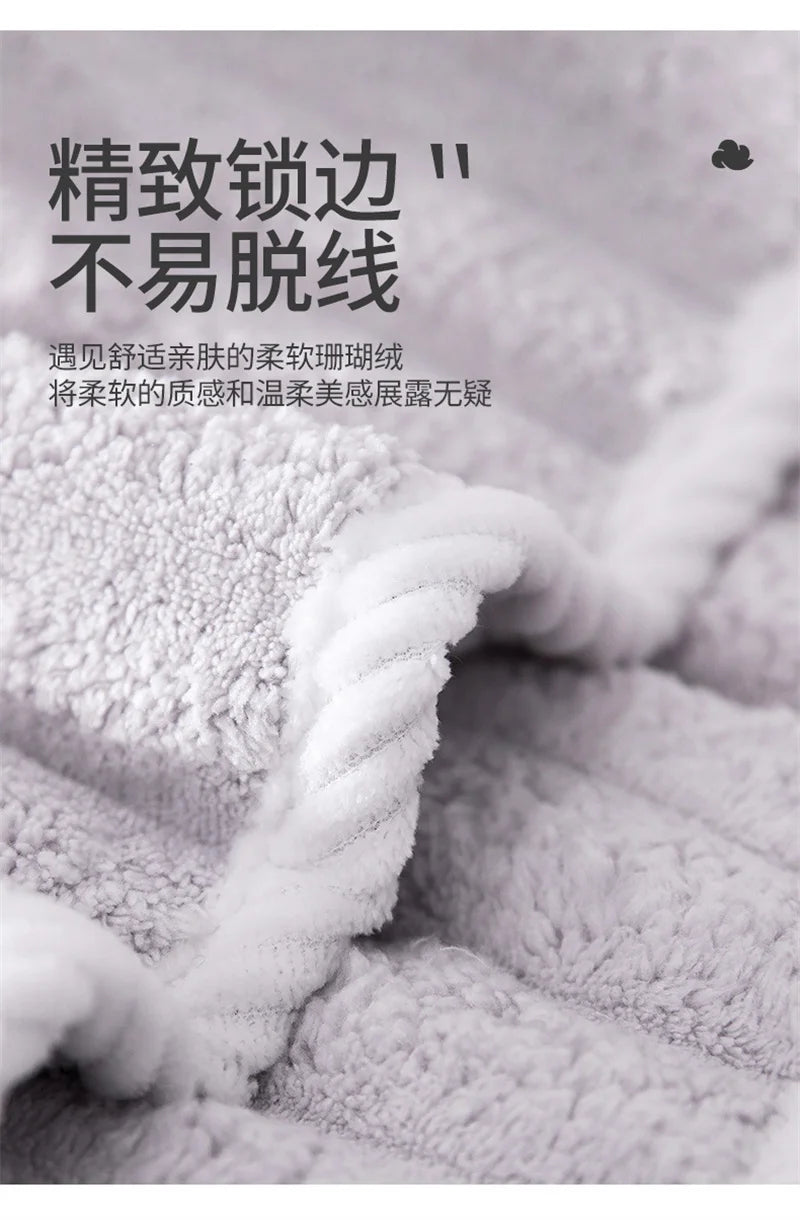 Close-up of a white microfiber towel showing its soft texture and woven pattern.