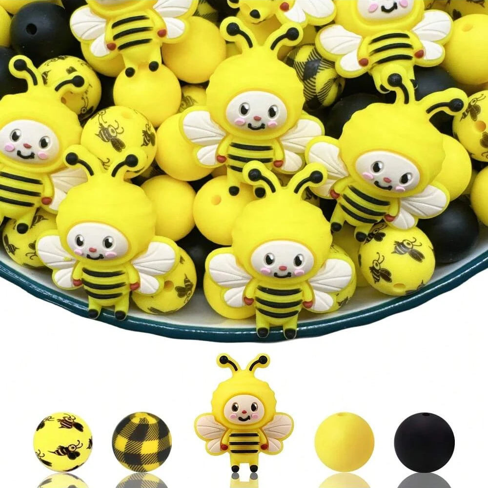 A collection of yellow and black 3D bee silicone beads for jewelry making and DIY crafts.