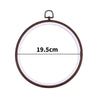 A circular wooden embroidery hoop with a metal hook for cross-stitch and needlework.