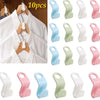 A set of 10 pink, white, and light blue cascading clothes hanger connector hooks for wardrobe organization.