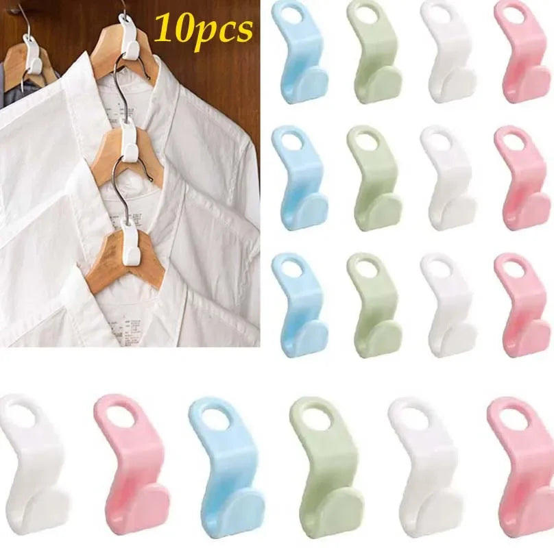 A set of 10 pink, white, and light blue cascading clothes hanger connector hooks for wardrobe organization.
