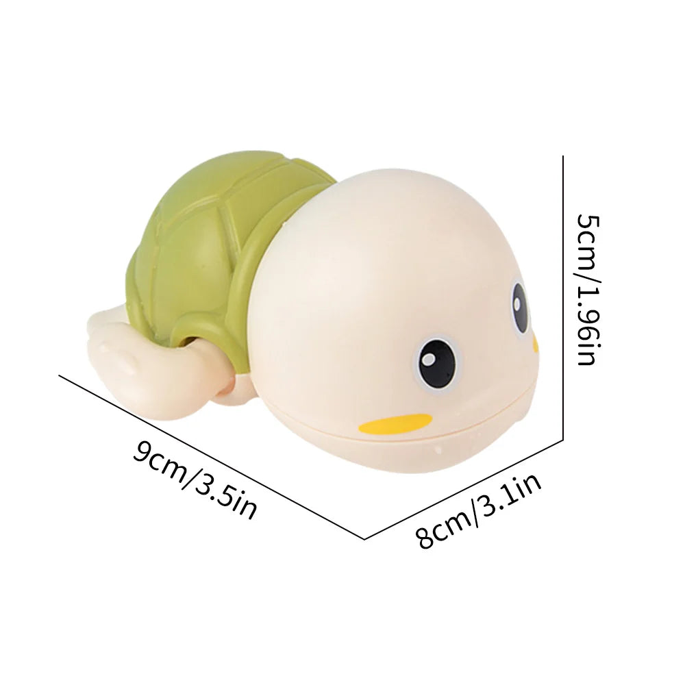 A light beige wind-up swimming turtle bath toy with a green shell and yellow accents.