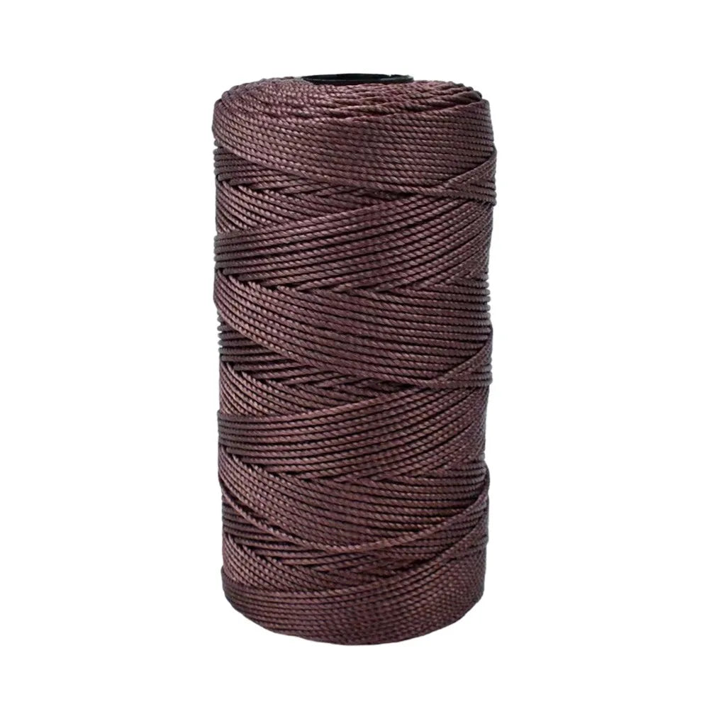 A spool of dark brown ice cotton silk thread for knitting and crochet.