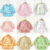 A collection of colorful waterproof long-sleeve baby bibs featuring various floral and patterned designs.