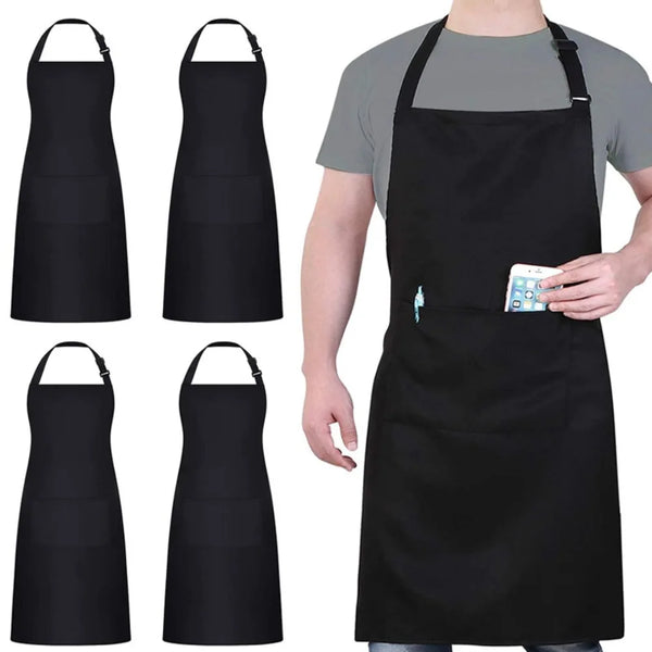 A person is wearing a black unisex water-resistant bib apron with pockets.