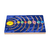 A wooden solar system puzzle featuring colorful planets and the sun arranged in a row on a blue background.