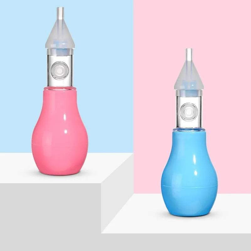 A gentle baby nasal aspirator in pink and blue is shown against a light background.