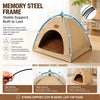A beige memory steel frame teepee tent with a brown cushion shown in an angled view.