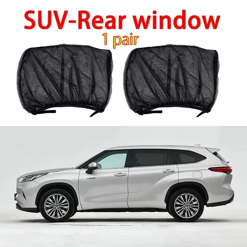 A pair of black mosquito mesh sunshades for a SUV rear window shown next to a silver car.
