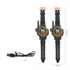 A set of kids camouflage walkie-talkie watches with orange straps and digital displays for outdoor play.