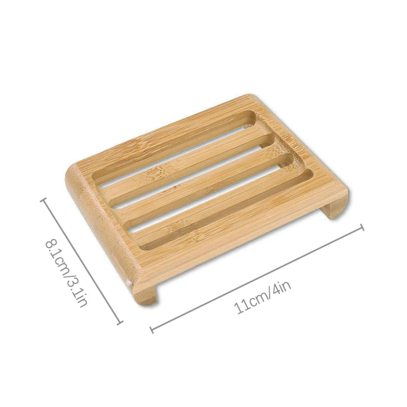 A wooden bamboo soap dish with parallel slats for fast-drying drainage.