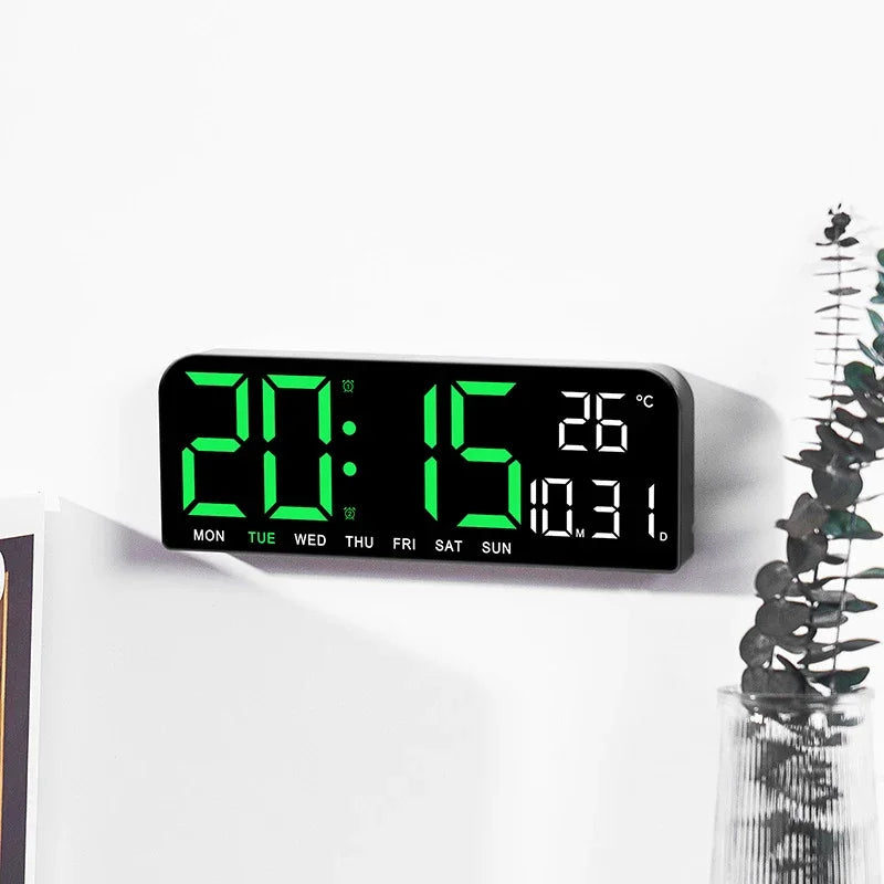 A black LED digital wall clock displaying the time 20:15 and a temperature of 26 degrees Celsius.