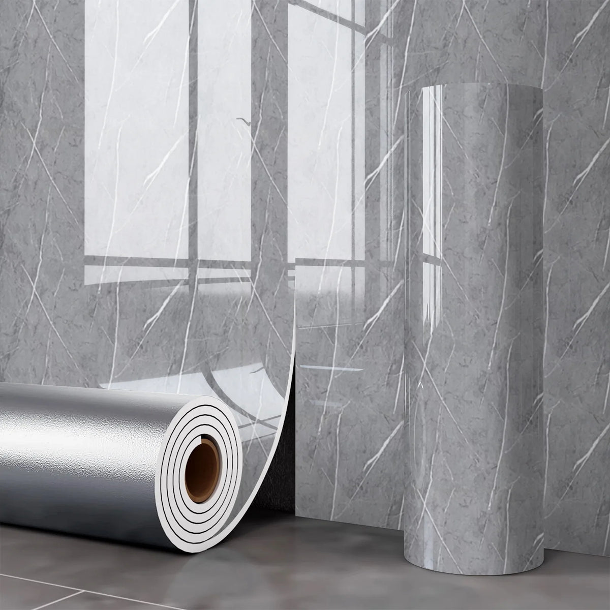 Roll of self-adhesive marble wall sticker for kitchen and bathroom displayed against a gray tiled wall.