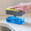 A hand is pressing a yellow dispenser top onto a clear blue liquid soap container.