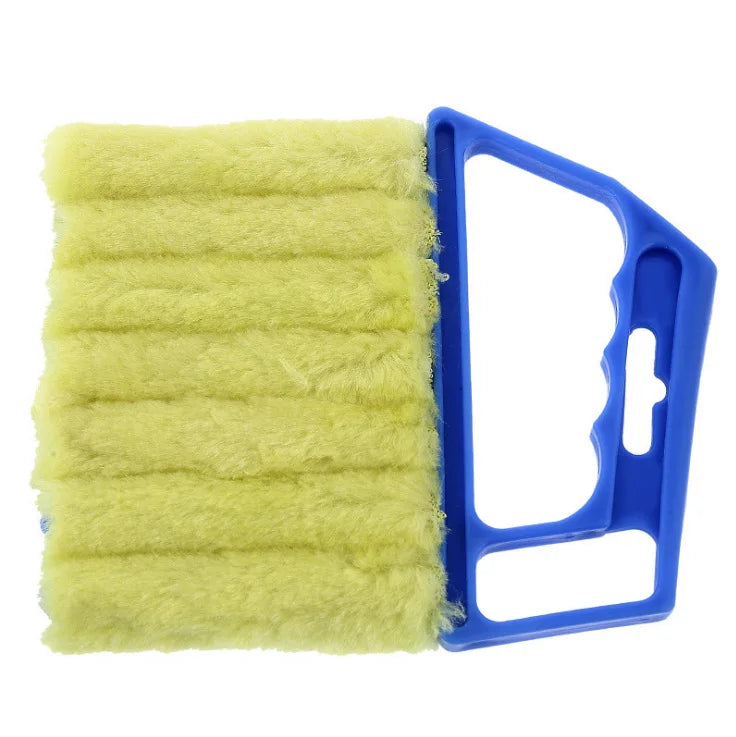 A yellow versatile dusting brush with a blue handle used for cleaning blinds and crevices.