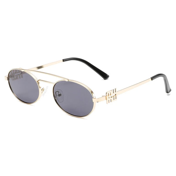 Gafas ovaladas de doble puente doradas y negras con protección UV400