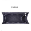 A dark gray felt bag organizer insert featuring a zippered pocket.