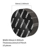 A circular black adhesive pad with a diameter of 50mm and a thickness of 2mm, shown from the side.