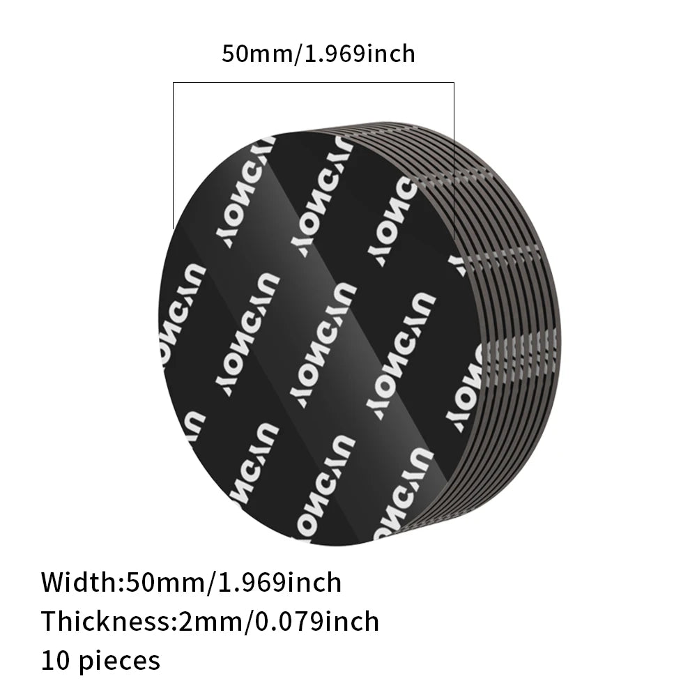 A circular black adhesive pad with a diameter of 50mm and a thickness of 2mm, shown from the side.