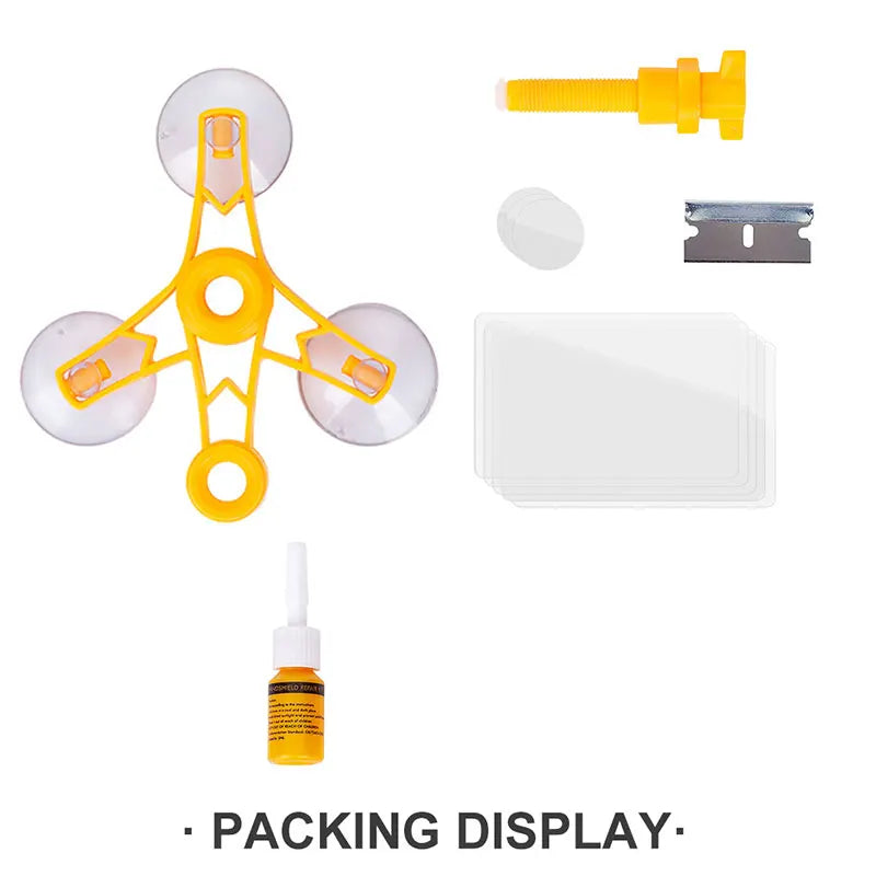 DIY auto glass repair kit components including a yellow applicator, a metal piece, and a white filler pad.