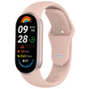 A pink silicone replacement strap for a fitness tracker, showing a digital display with time and activity metrics.