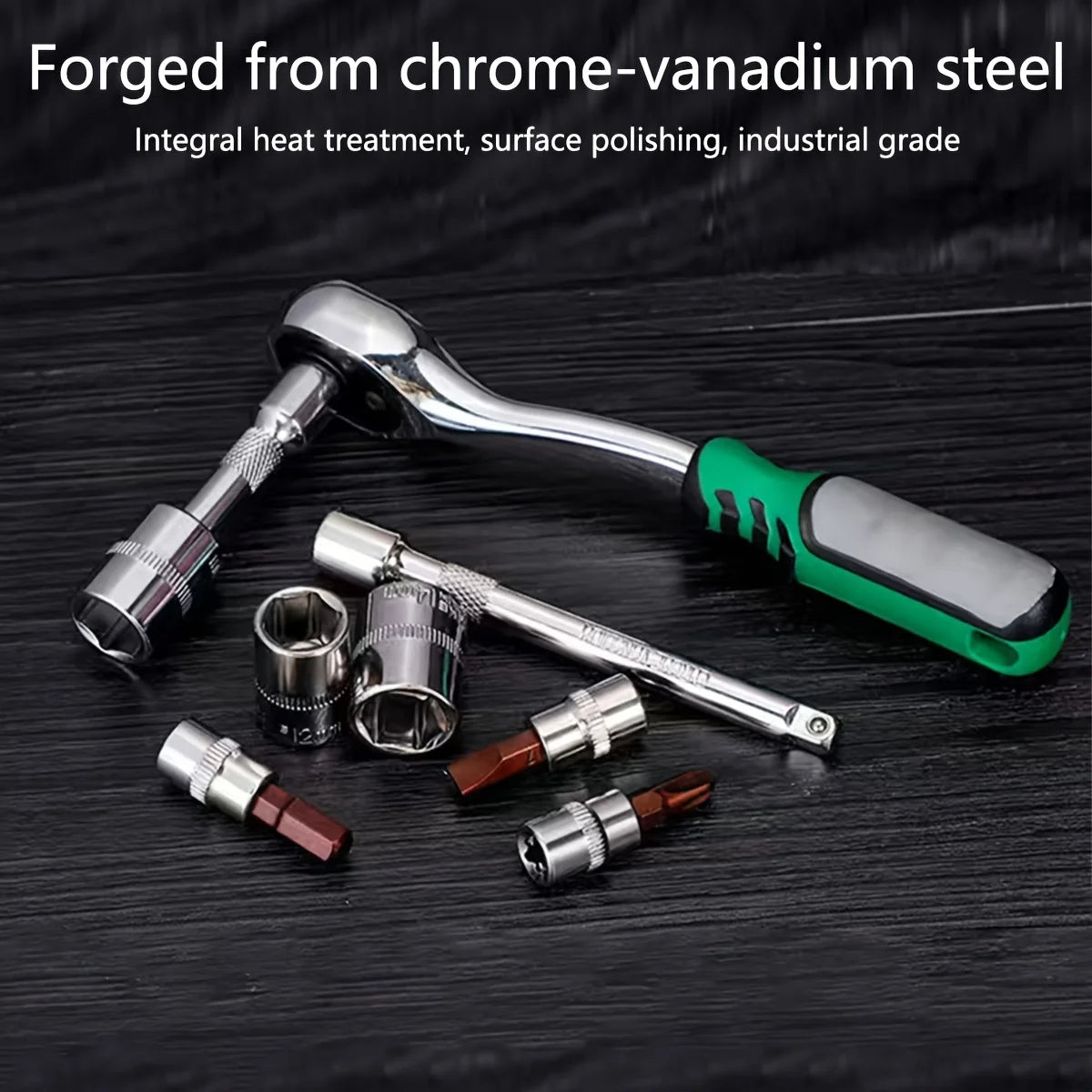 A set of chrome-vanadium steel mechanic's tools including a ratchet and various bits on a dark surface.