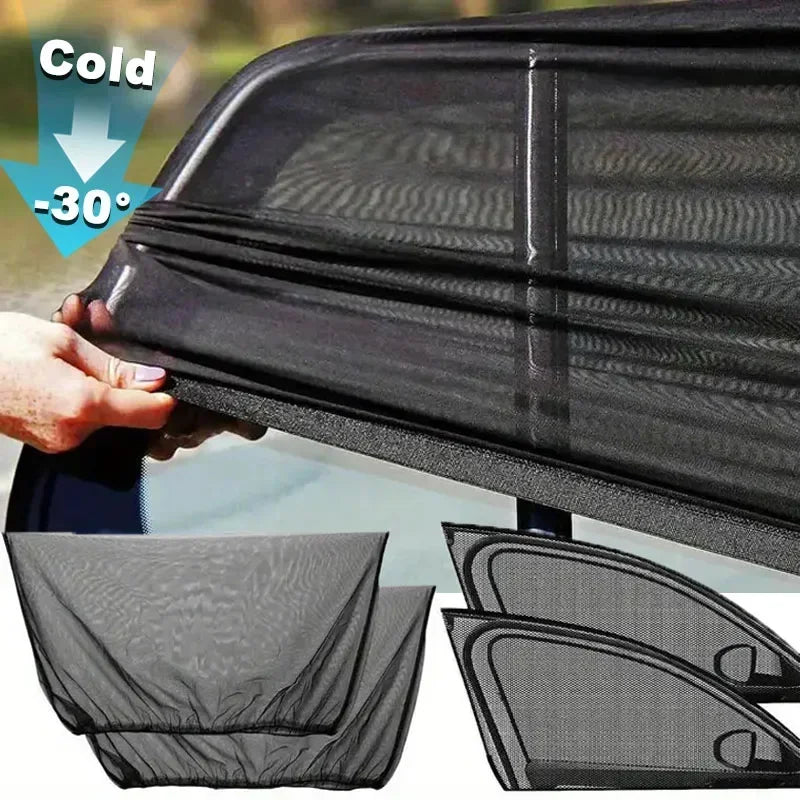 A hand is holding a black car side window sunshade with mosquito mesh, showing its texture and folding design.