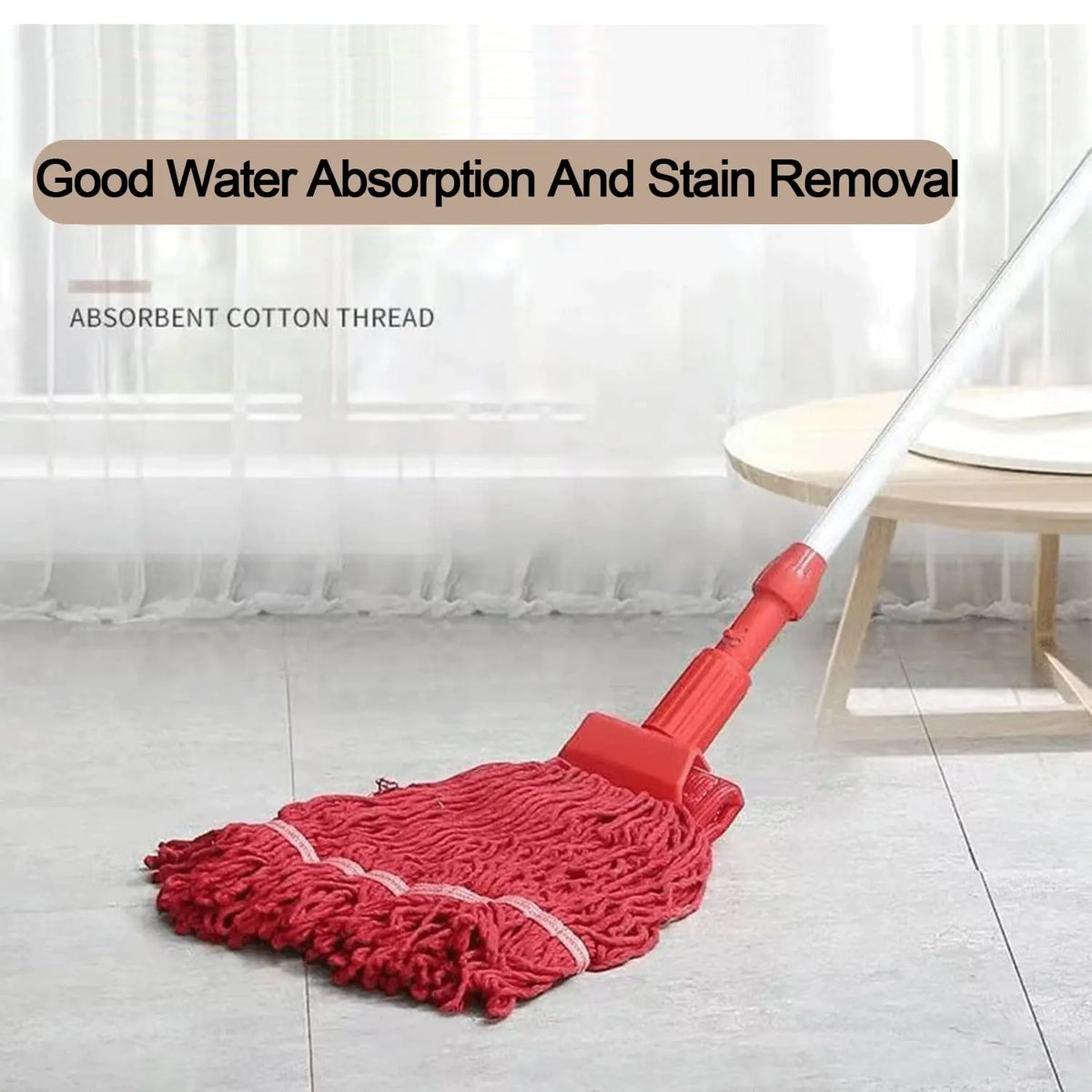 Red absorbent cotton thread mop head with a white handle used for cleaning.