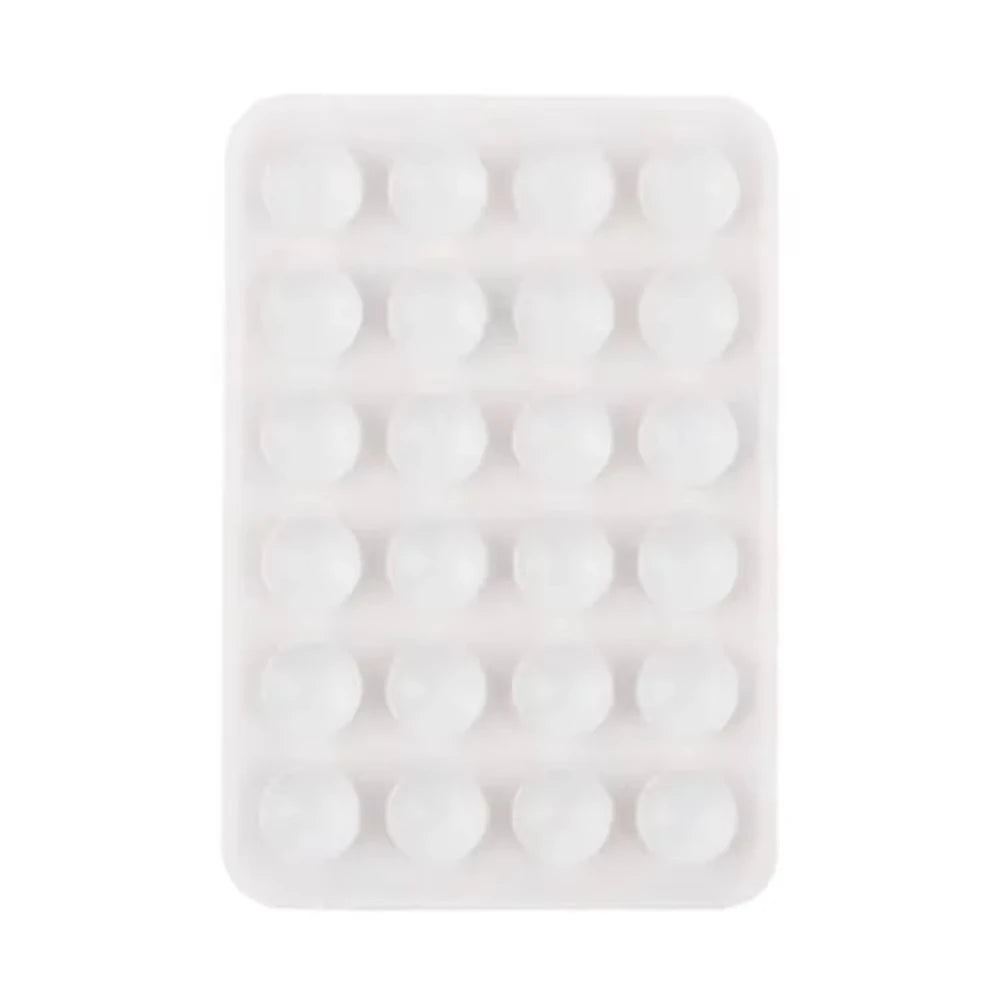 A white silicone suction cup phone mount with multiple holes for hands-free viewing.