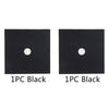 Two black stove burner mats with a circular hole each